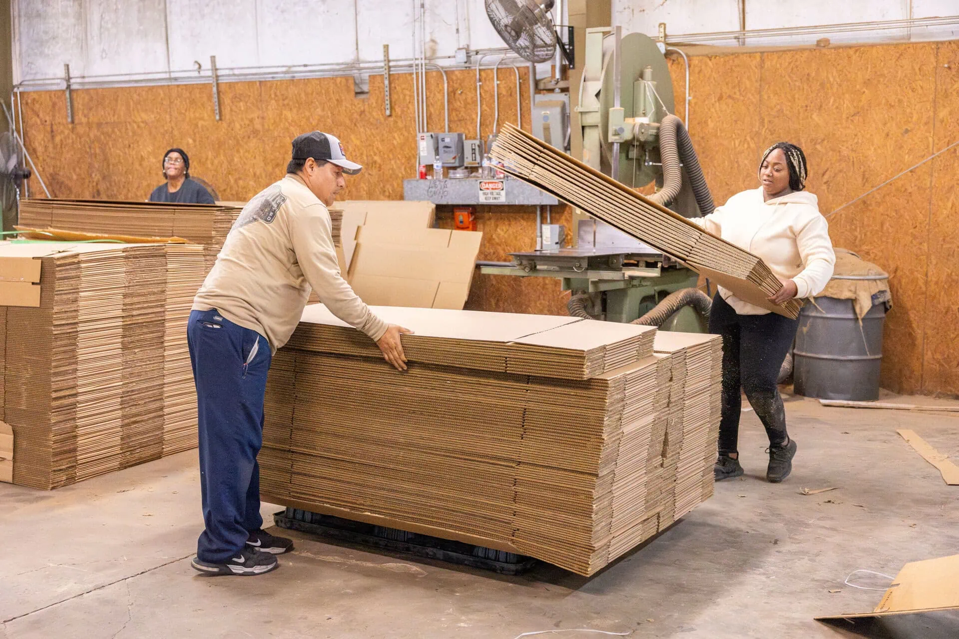 People with corrugated boxes