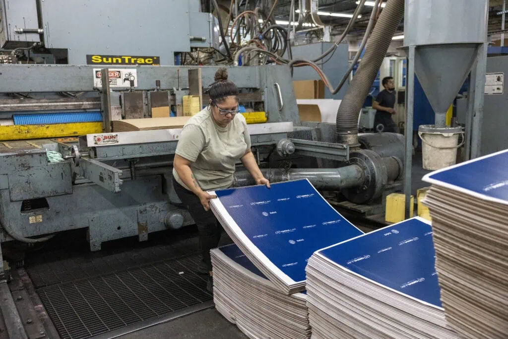 employees organizing custom packaging boxes