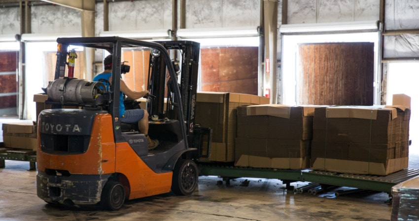 lift moving cardboard boxes