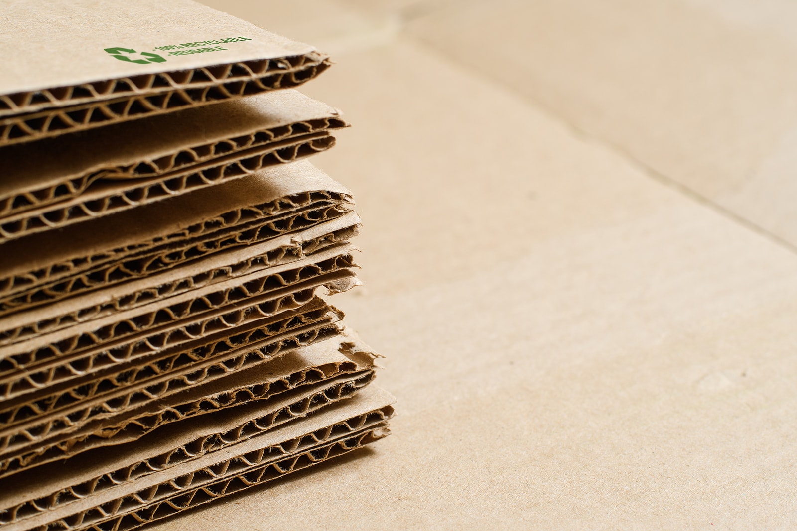 stack of flat corrugated cardboard boxes