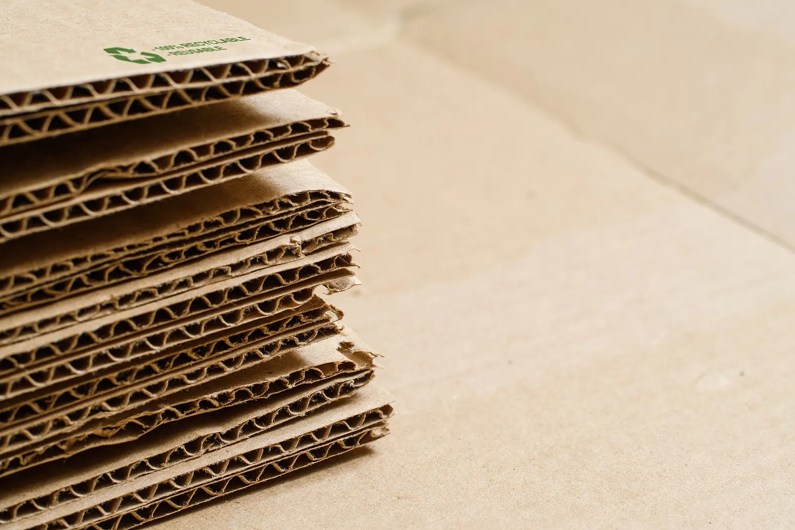 stack of flat corrugated cardboard boxes